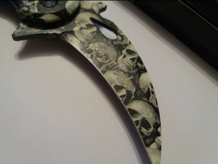 /products/karambit-skull/